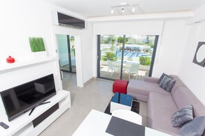 Standard Condo, Pool View | Desk, blackout drapes, soundproofing, iron/ironing board - Q Spa Resort (Manavgat)