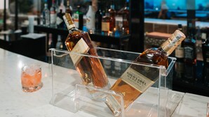 A bar area with bottles of Johnnie Walker Gold Label Reserve on display. - Monarch Hotel (Addis Ababa)