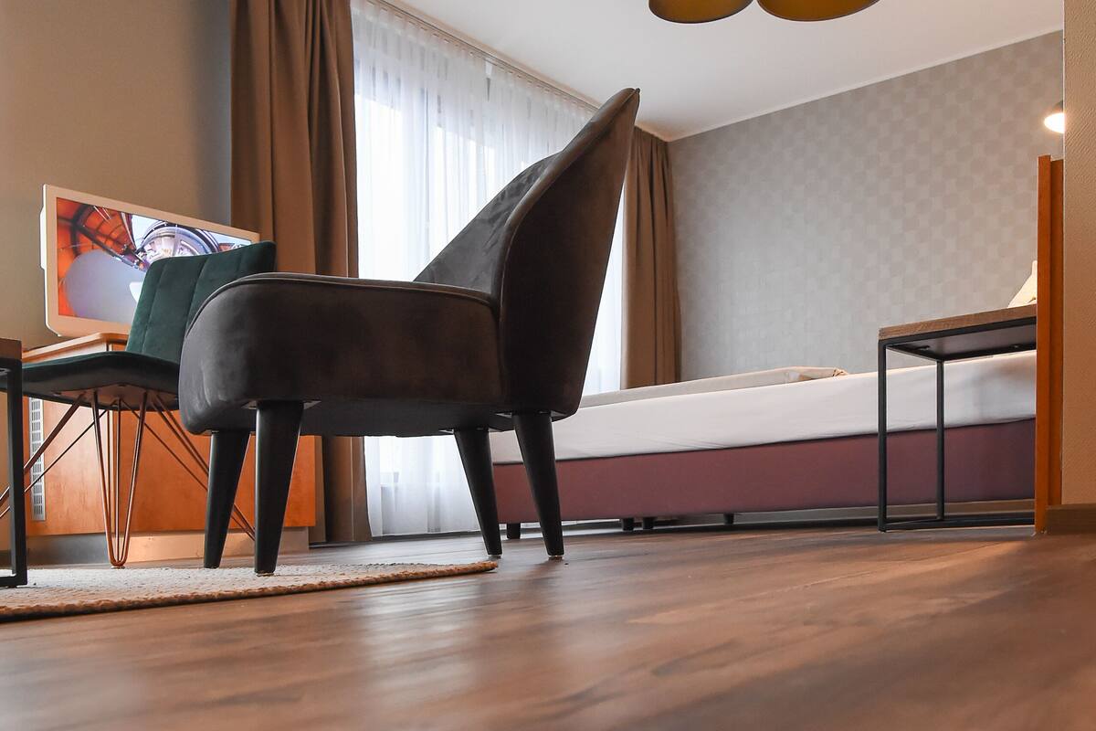 junior suite | living area | flat-screen tv