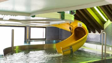 Slide into fun at this pool with a thrilling water slide.