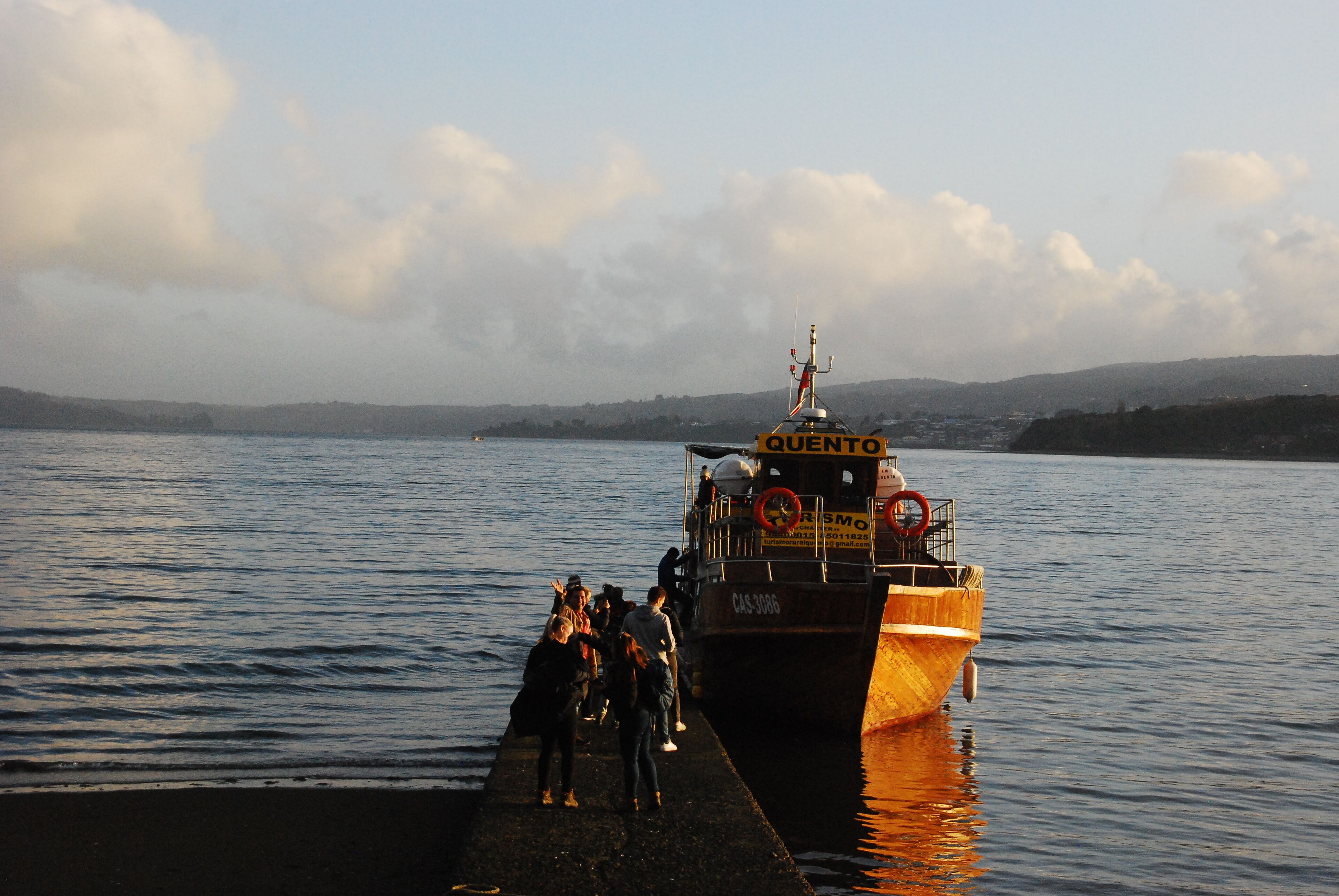 on the beach, black sand, beach towels, kayaking