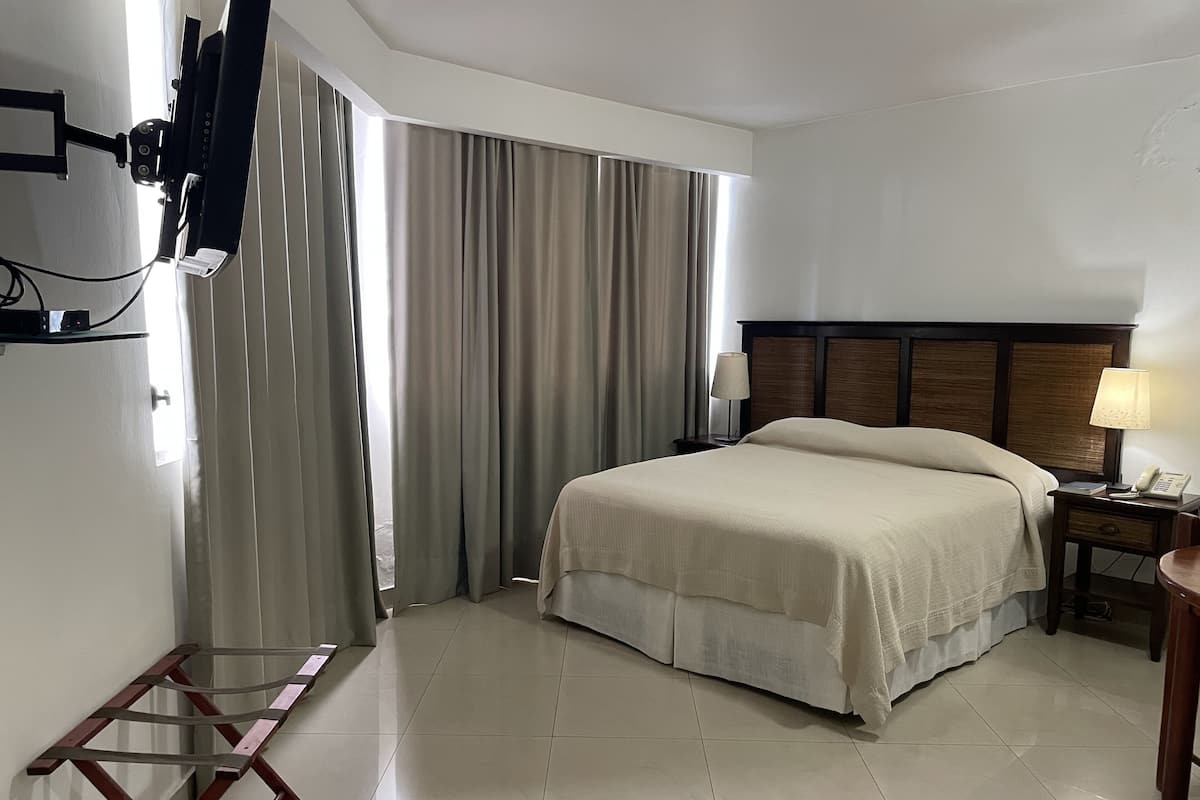 Standard Double Room | 1 bedroom, in-room safe, individually decorated, individually furnished