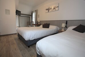 Family Room | Individually decorated, desk, blackout drapes, iron/ironing board