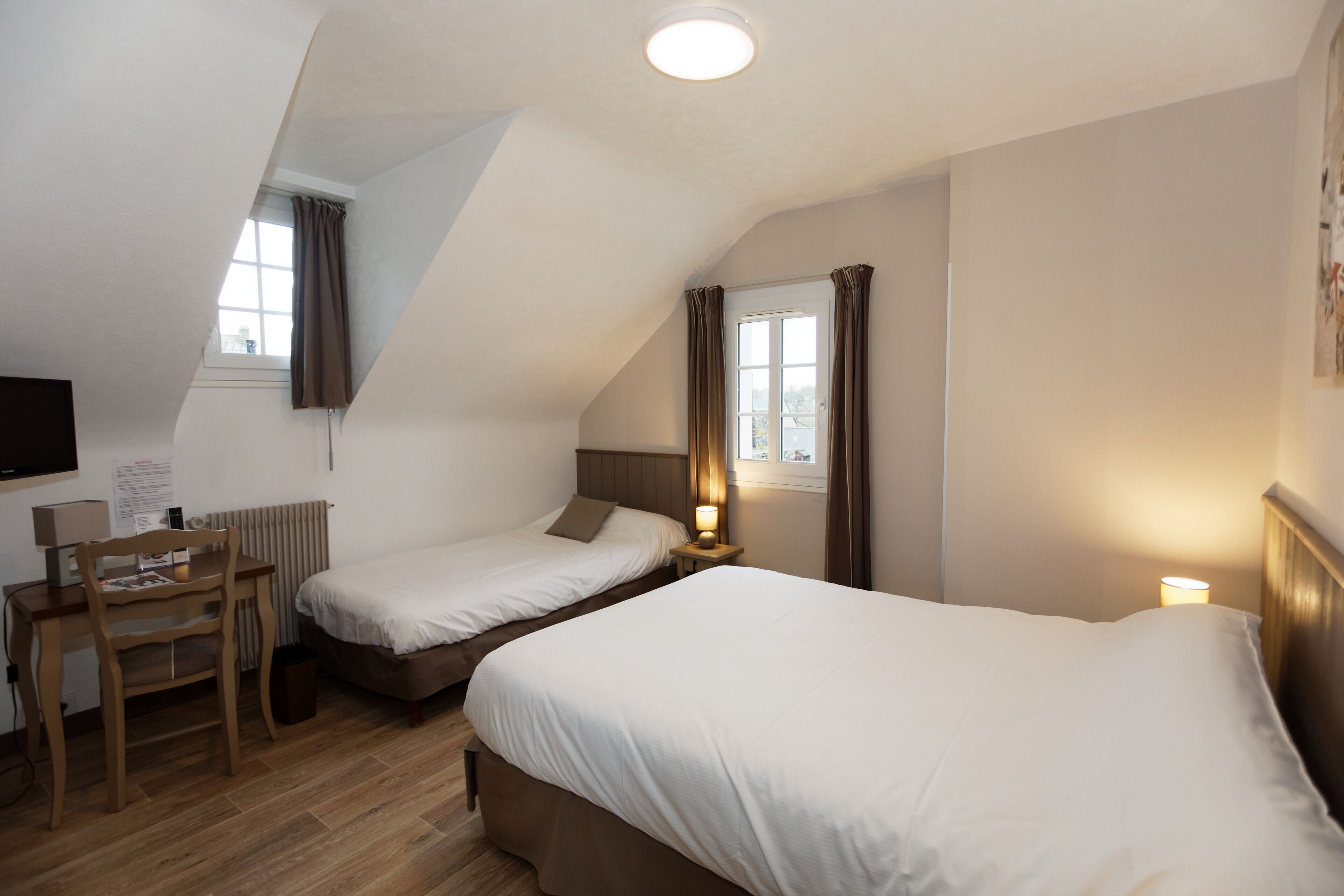 family room | individually decorated, desk, blackout curtains, iron/ironing board