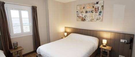 Family Room | Individually decorated, desk, blackout curtains, iron/ironing board