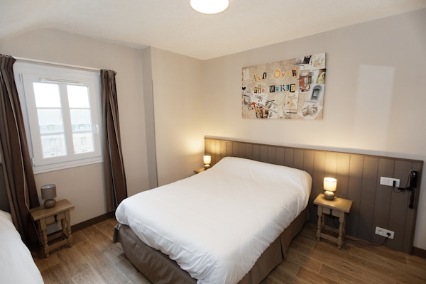 Family Room | Individually decorated, desk, blackout curtains, iron/ironing board