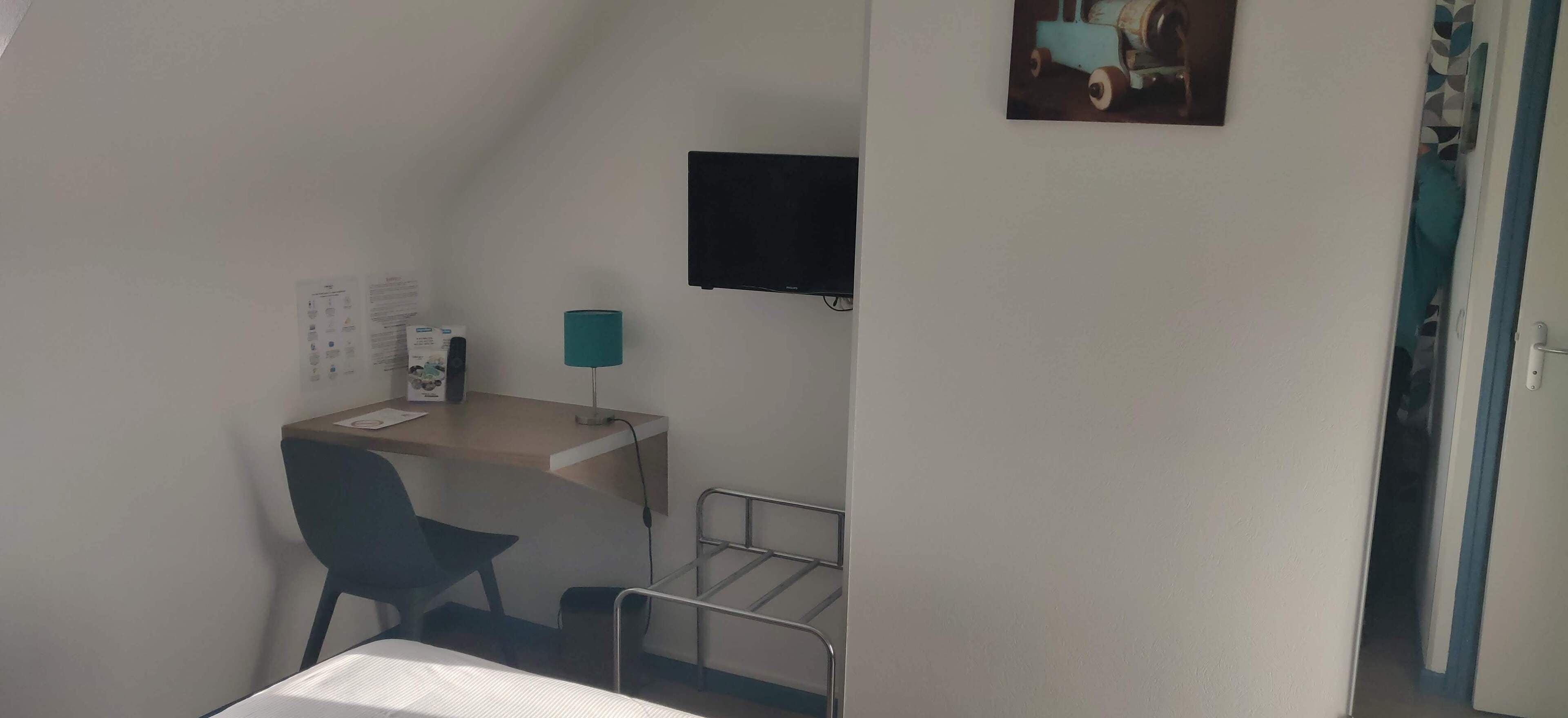 individually decorated, desk, blackout curtains, iron/ironing board