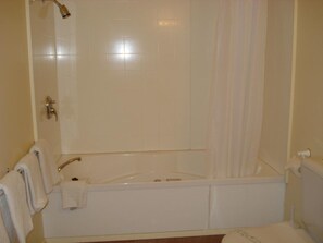 Apartment, 1 Bedroom, Kitchenette, Ground Floor | Bathroom | Combined shower/tub, free toiletries, hair dryer, towels