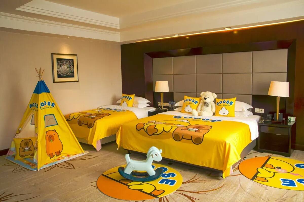 Family Room, Multiple Beds | Down duvets, minibar, in-room safe, desk