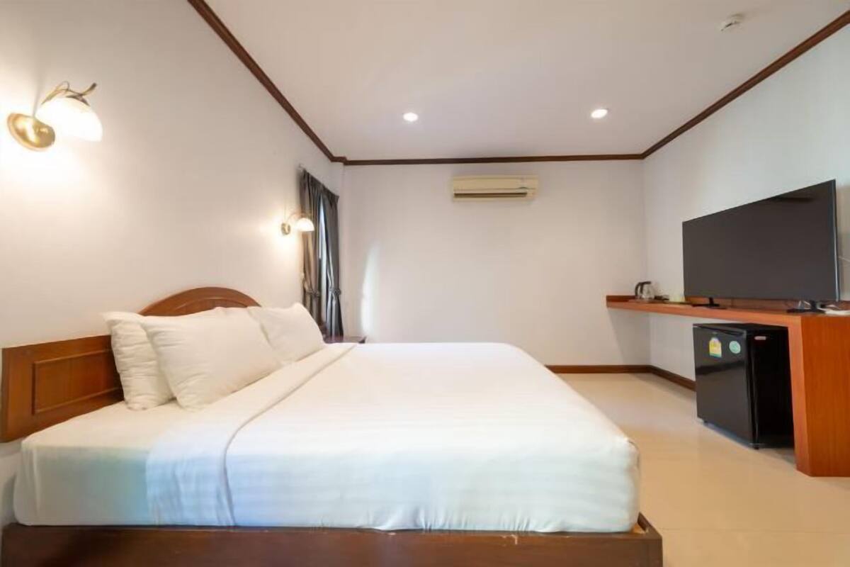 Zimmersafe, Verdunkelungsvorhänge, Zustellbetten, kostenloses WLAN