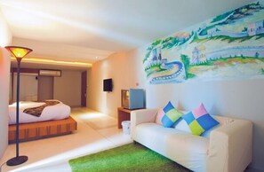Thai Hip Family | Living area | 32-inch LCD TV with satellite channels, TV, DVD player