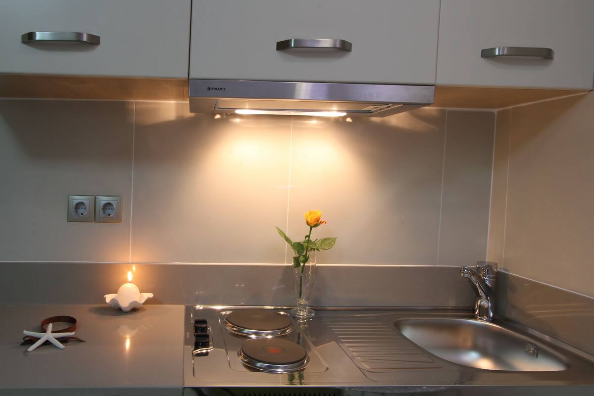junior studio suite, 1 king bed, beach view, beachfront | private kitchenette | fridge, microwave, stovetop, coffee/tea maker