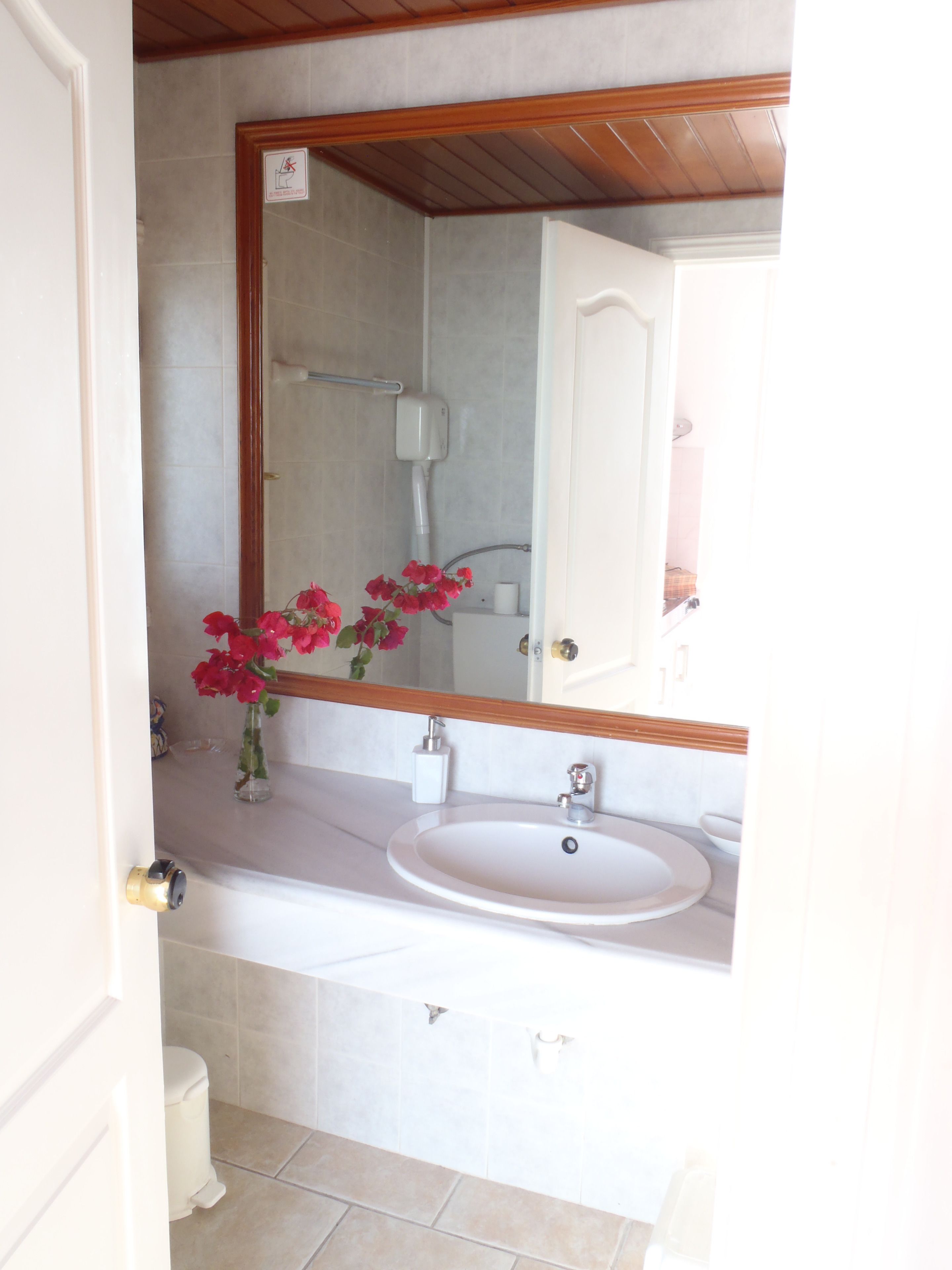 comfort studio, 1 bedroom, beach view | bathroom | free toiletries, hair dryer, slippers, towels