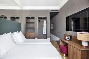 Roba de llit d'alta qualitat, minibar i caixa forta a l'habitació 