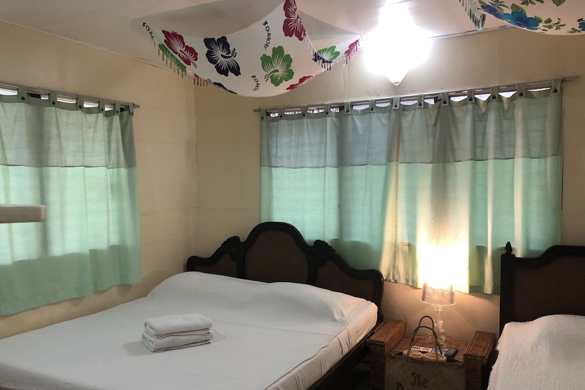 Bungalow Deluxe, balcon | Coffres-forts dans les chambres, fer et planche à repasser