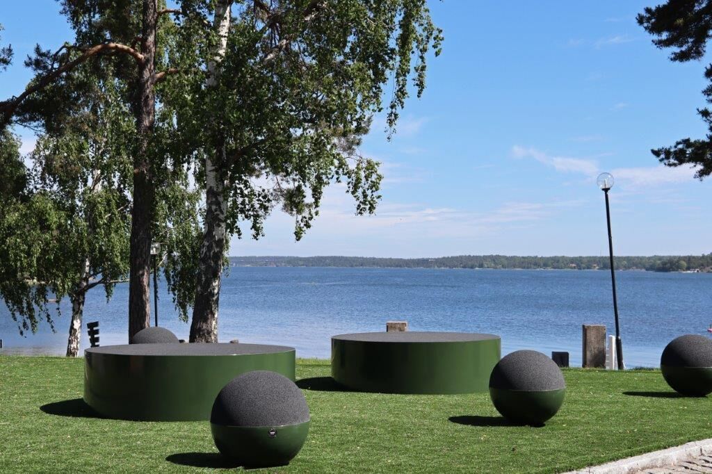 Outdoor seating with a lake view.