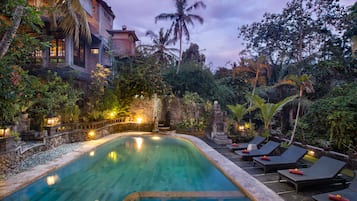 Outdoor pool, open 7:00 AM to 7:00 PM, pool loungers