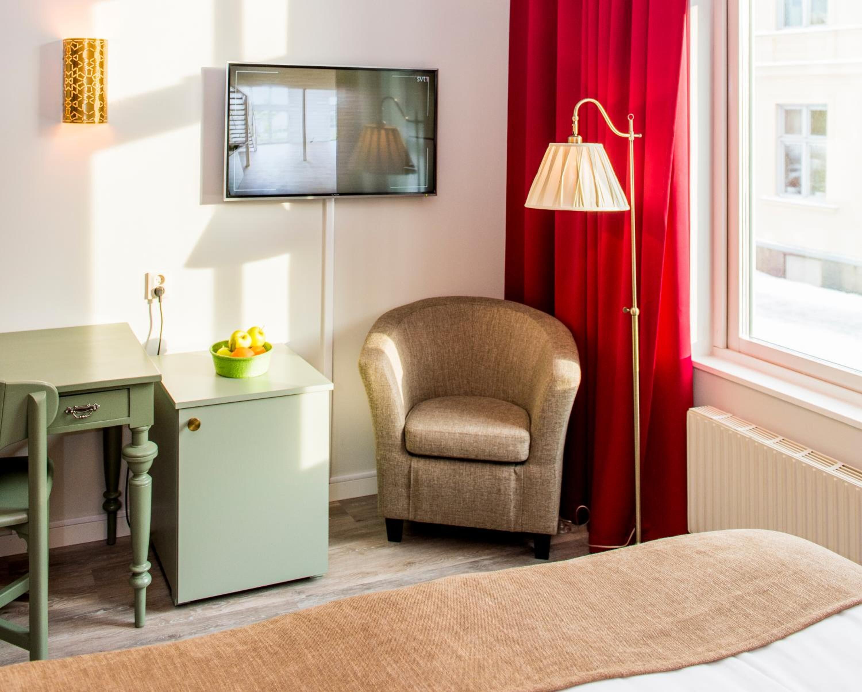 individually decorated, individually furnished, desk, blackout curtains