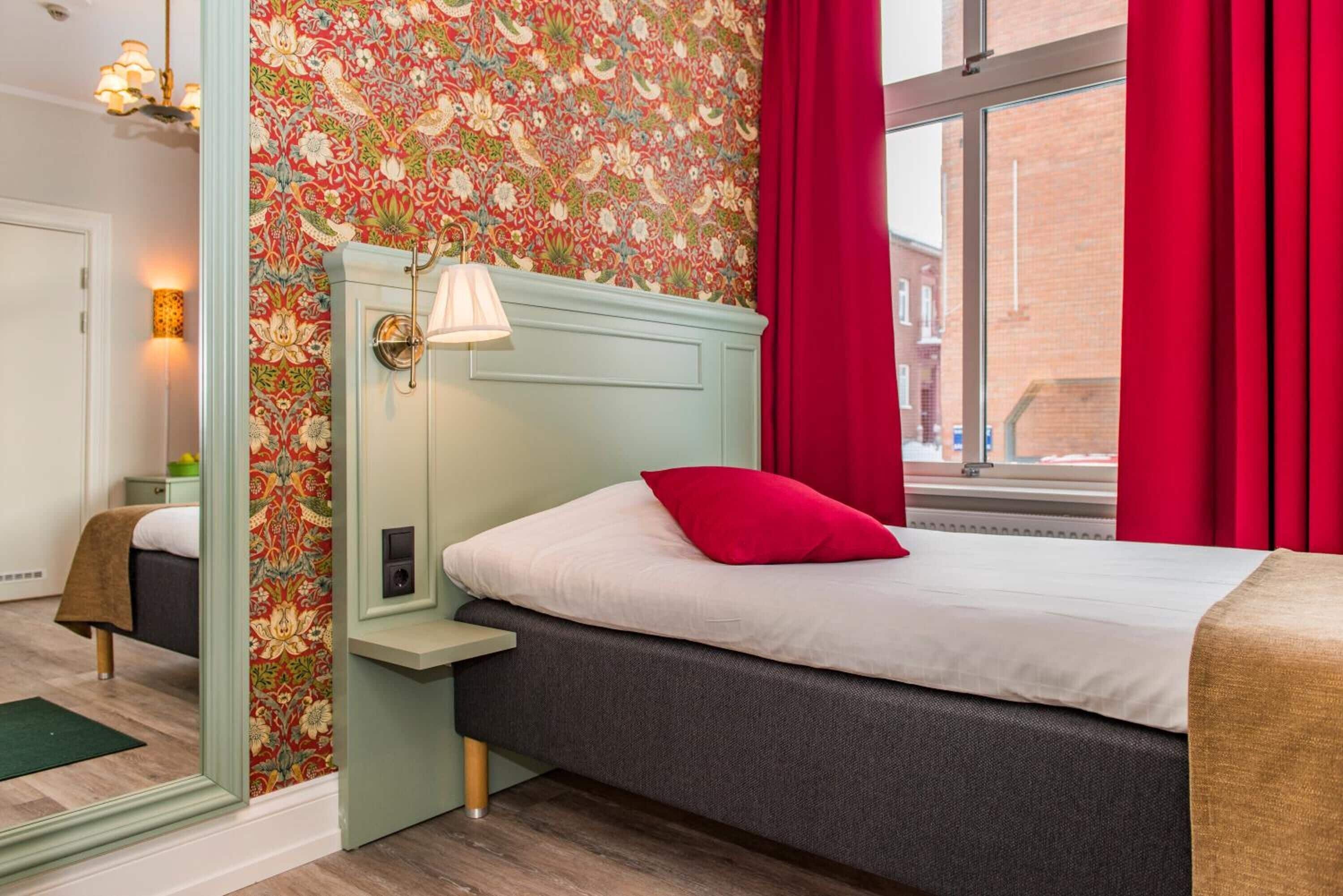 Individually decorated, individually furnished, desk, blackout curtains