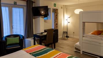 Quarto família | Roupas de cama antialérgicas, frigobar, cofres nos quartos