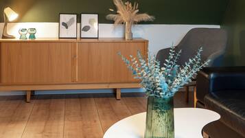 Big Family Apartment | Living area | 32-inch TV with cable channels, table football, heated floors