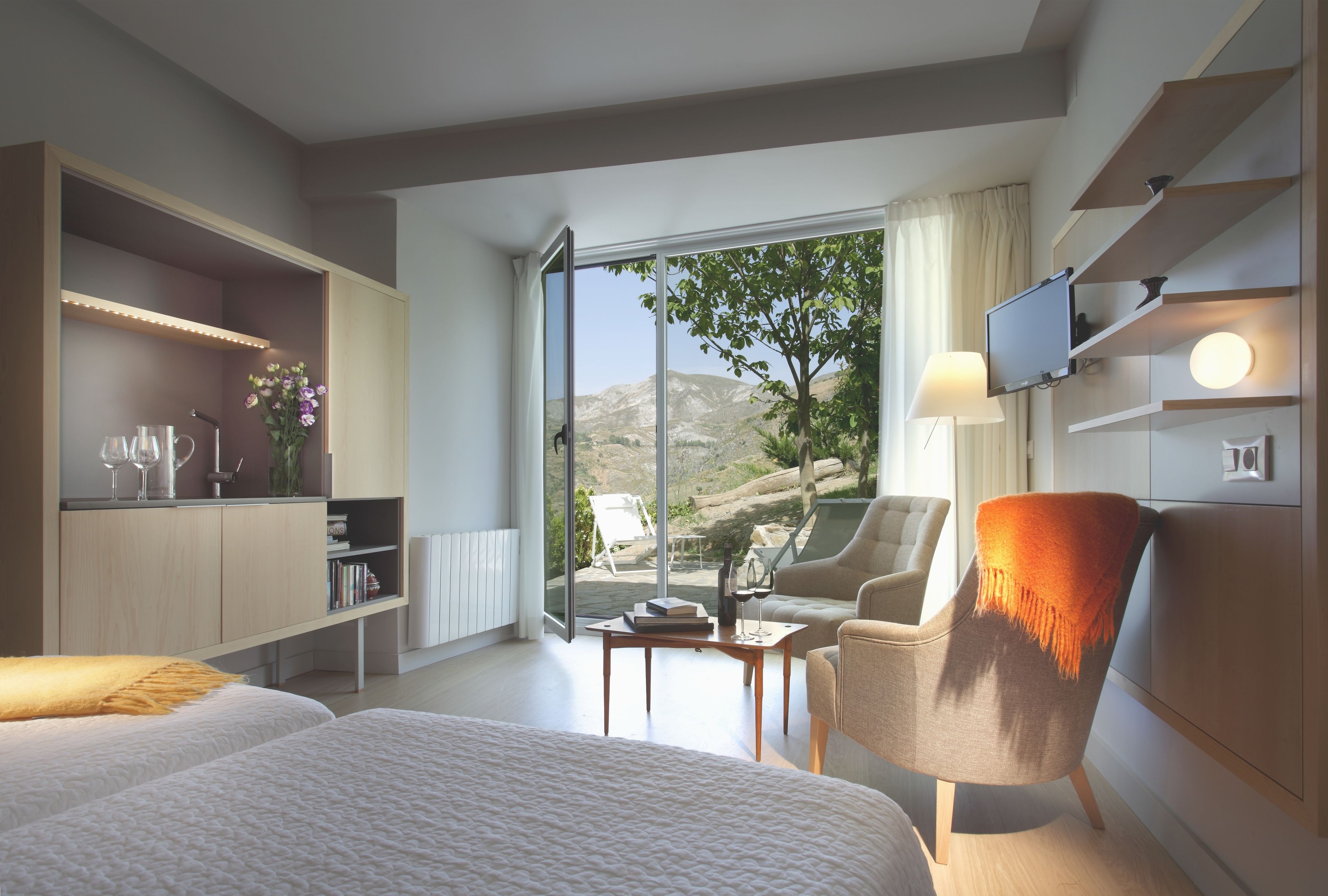 superior double room, terrace, mountain view | living room | tv