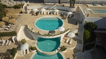 3 outdoor pools, open 10:00 AM to 7:00 PM, pool umbrellas, sun loungers