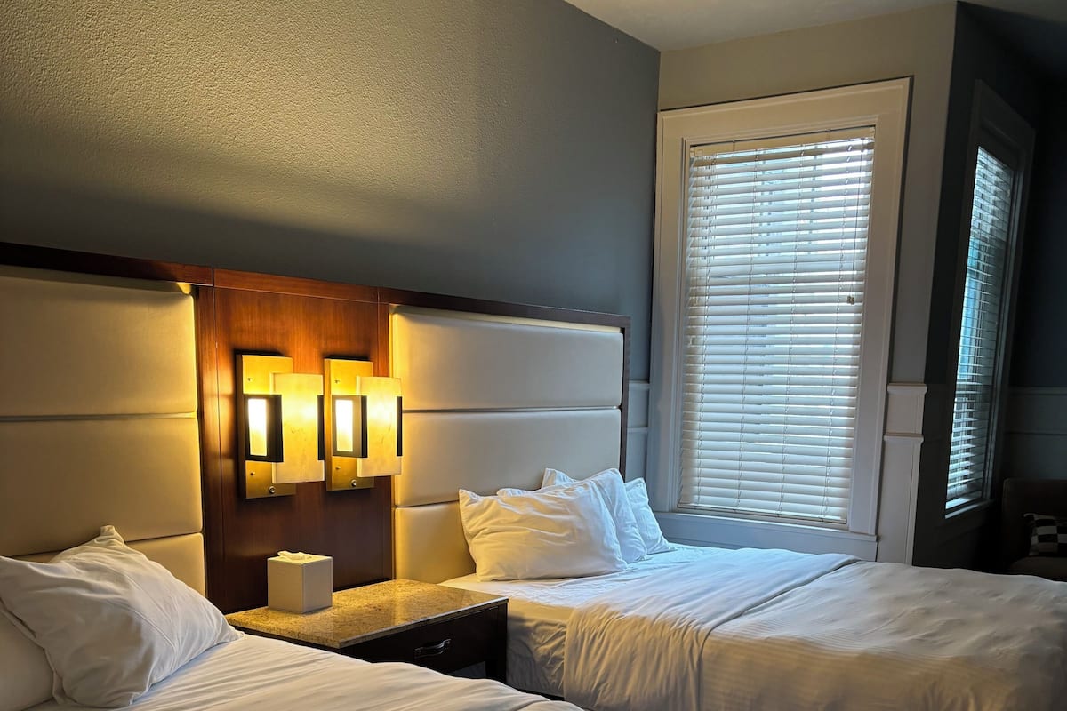 Room, 2 Queen Beds | Iron/ironing board, free WiFi, bed sheets