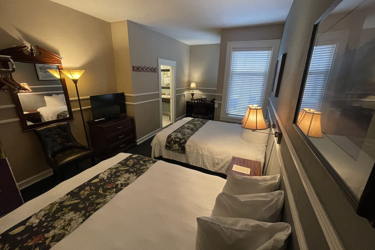 room, 2 queen beds | 1 bedroom, iron/ironing board, free wifi, bed sheets