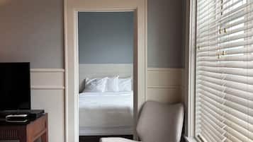 Habitación familiar | Tabla de planchar con plancha, wifi gratis y ropa de cama