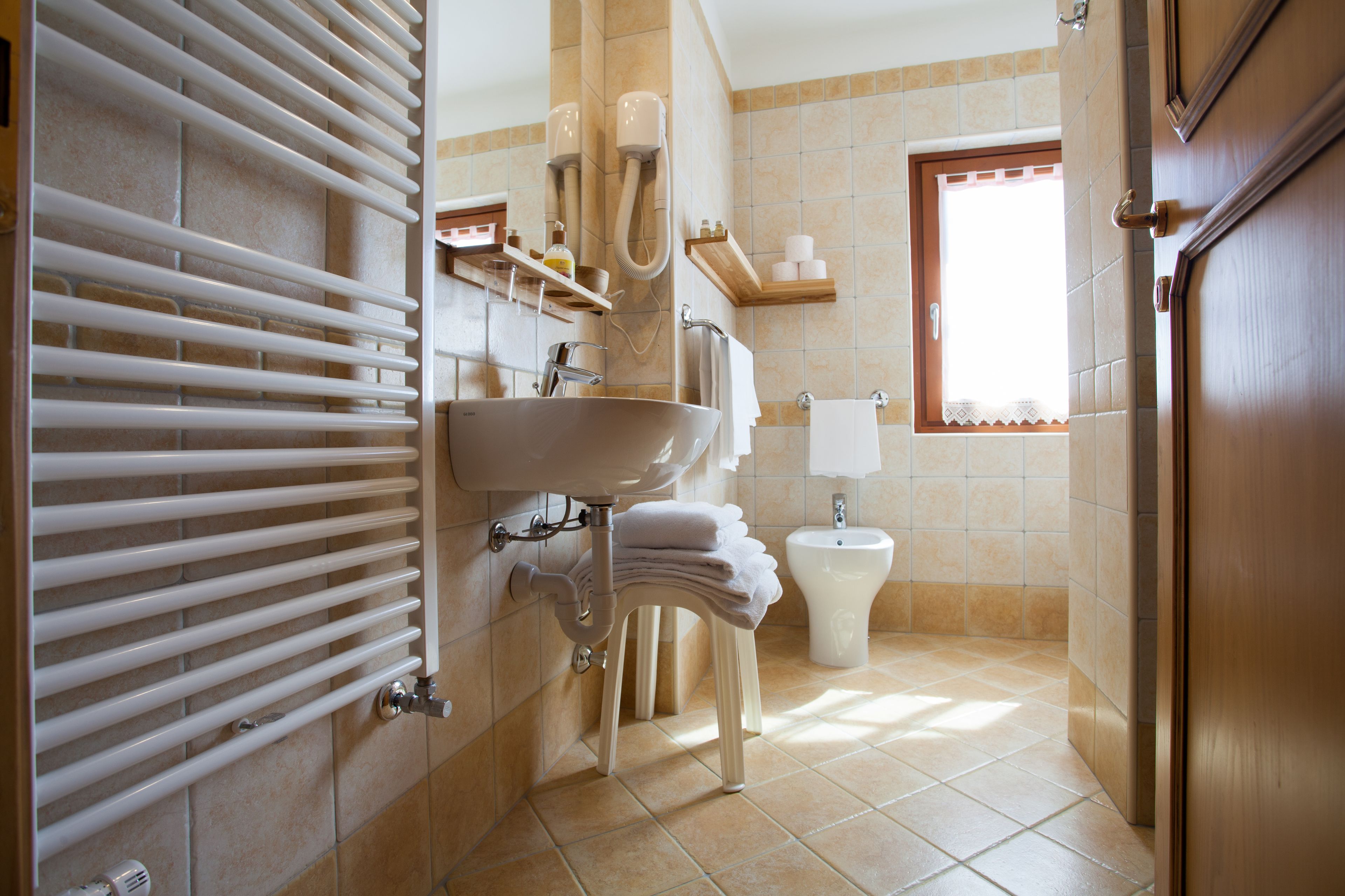 family suite | bathroom | shower, free toiletries, hair dryer, bidet