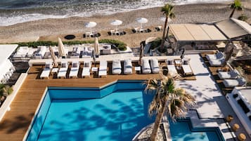 Seasonal outdoor pool, pool umbrellas, sun loungers