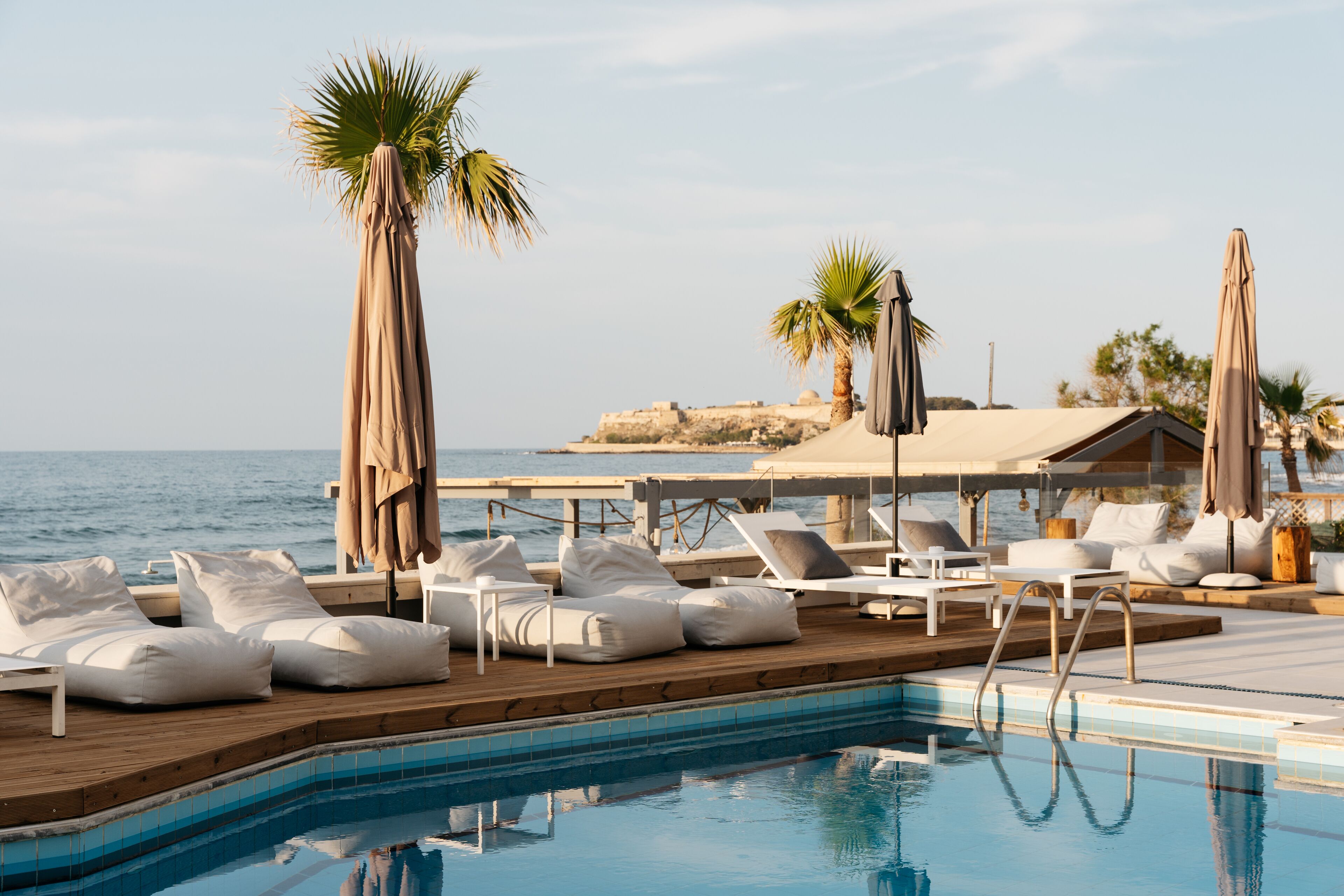 Seasonal outdoor pool, pool umbrellas, pool loungers