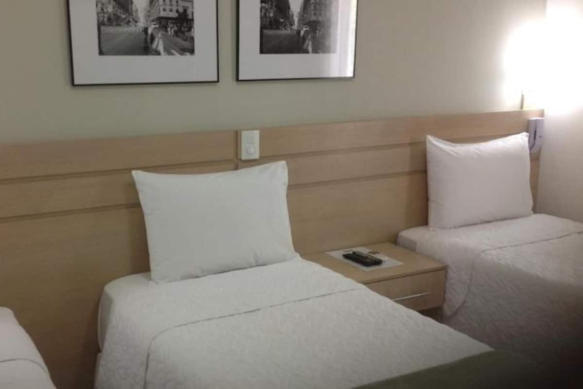 Minibar, desk, blackout curtains, iron/ironing board