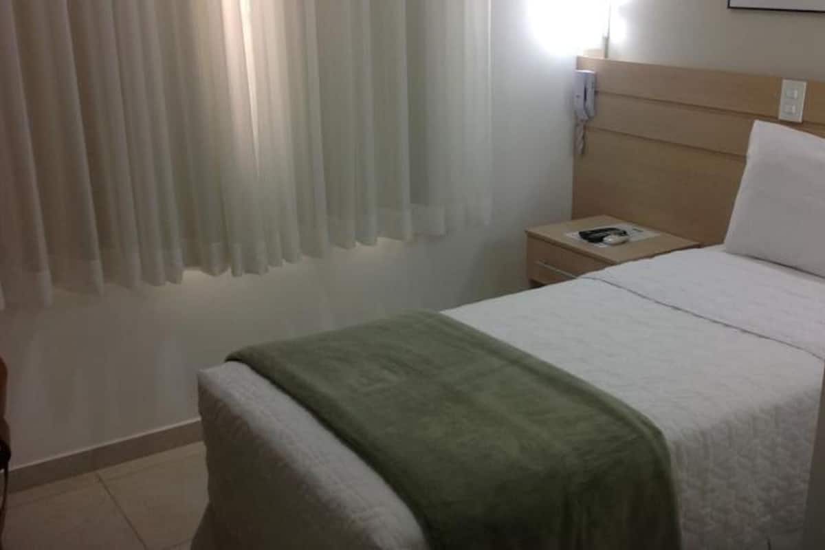 Minibar, desk, blackout curtains, iron/ironing board