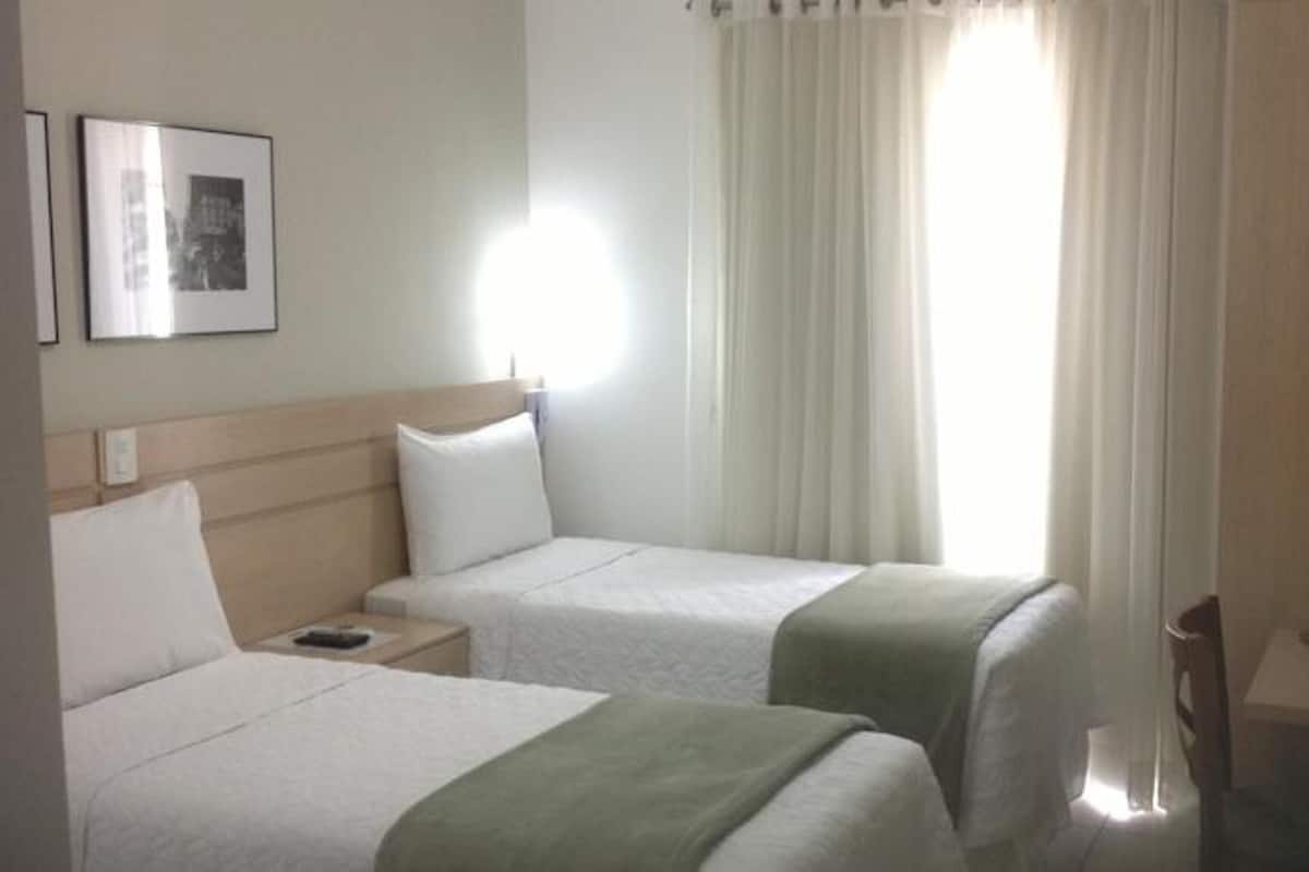 Minibar, desk, blackout curtains, iron/ironing board