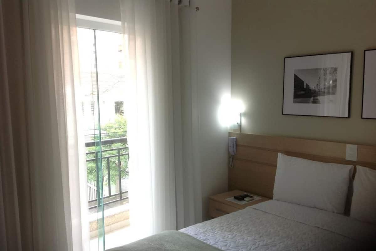 Standard Double Room | Minibar, desk, blackout curtains, iron/ironing board