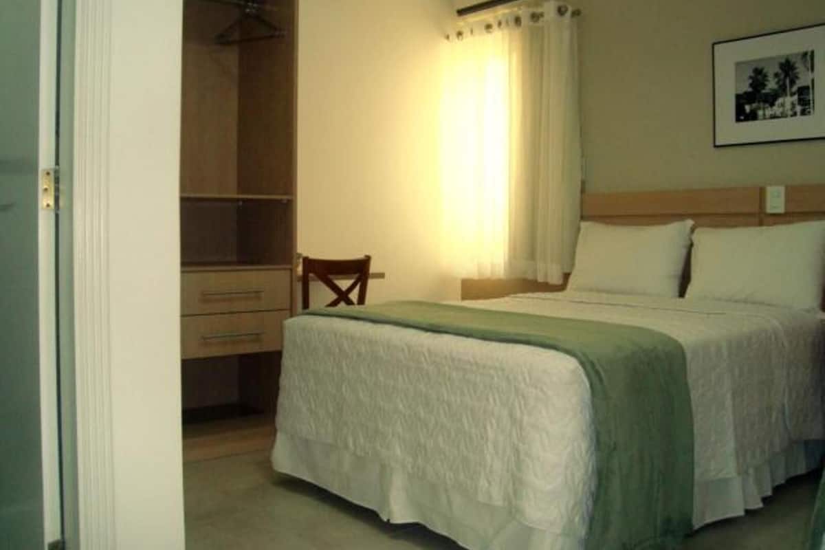 Minibar, desk, blackout curtains, iron/ironing board