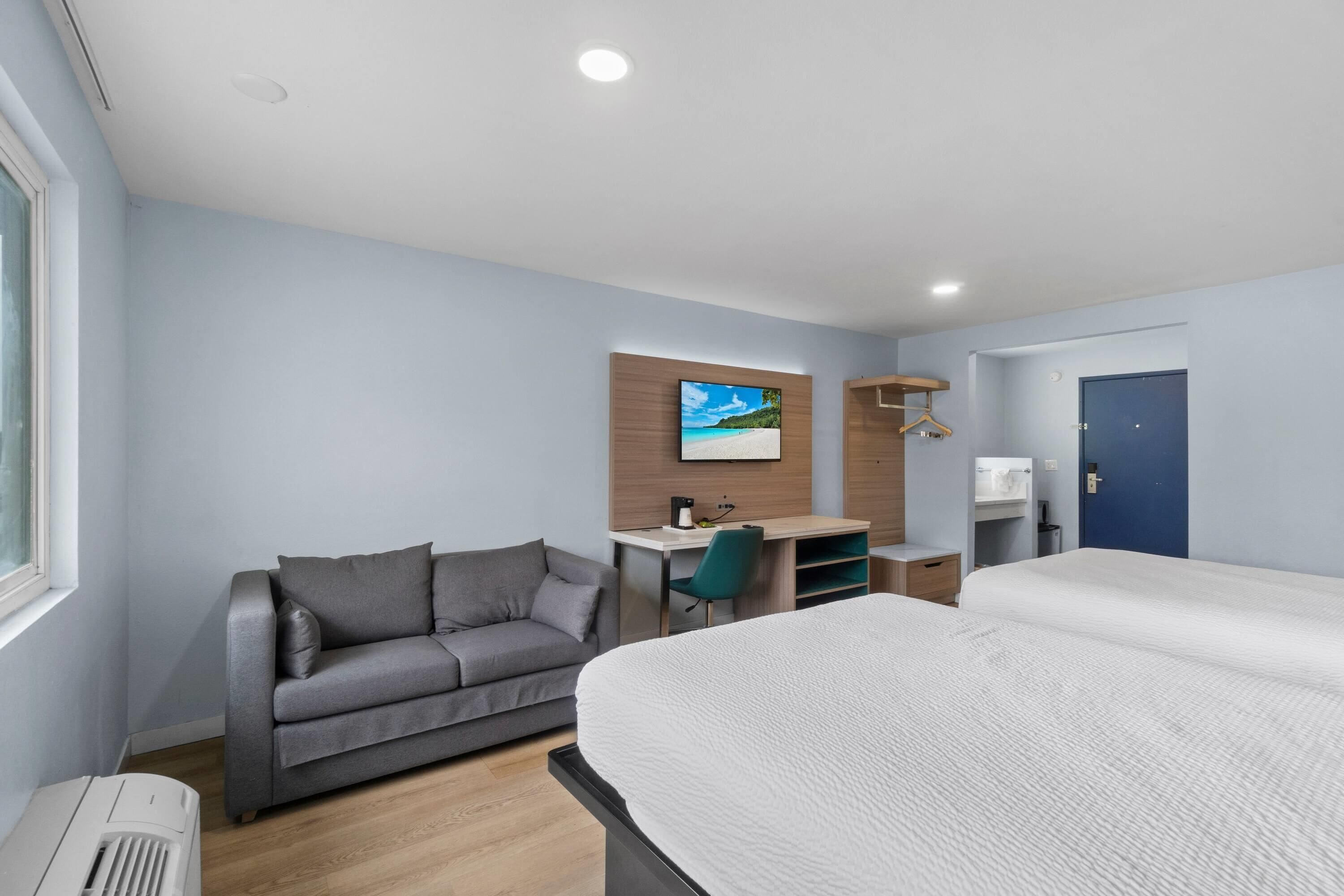 Chambre, 2 grands lits, non-fumeurs | Bureau, Wi-Fi gratuit, draps fournis