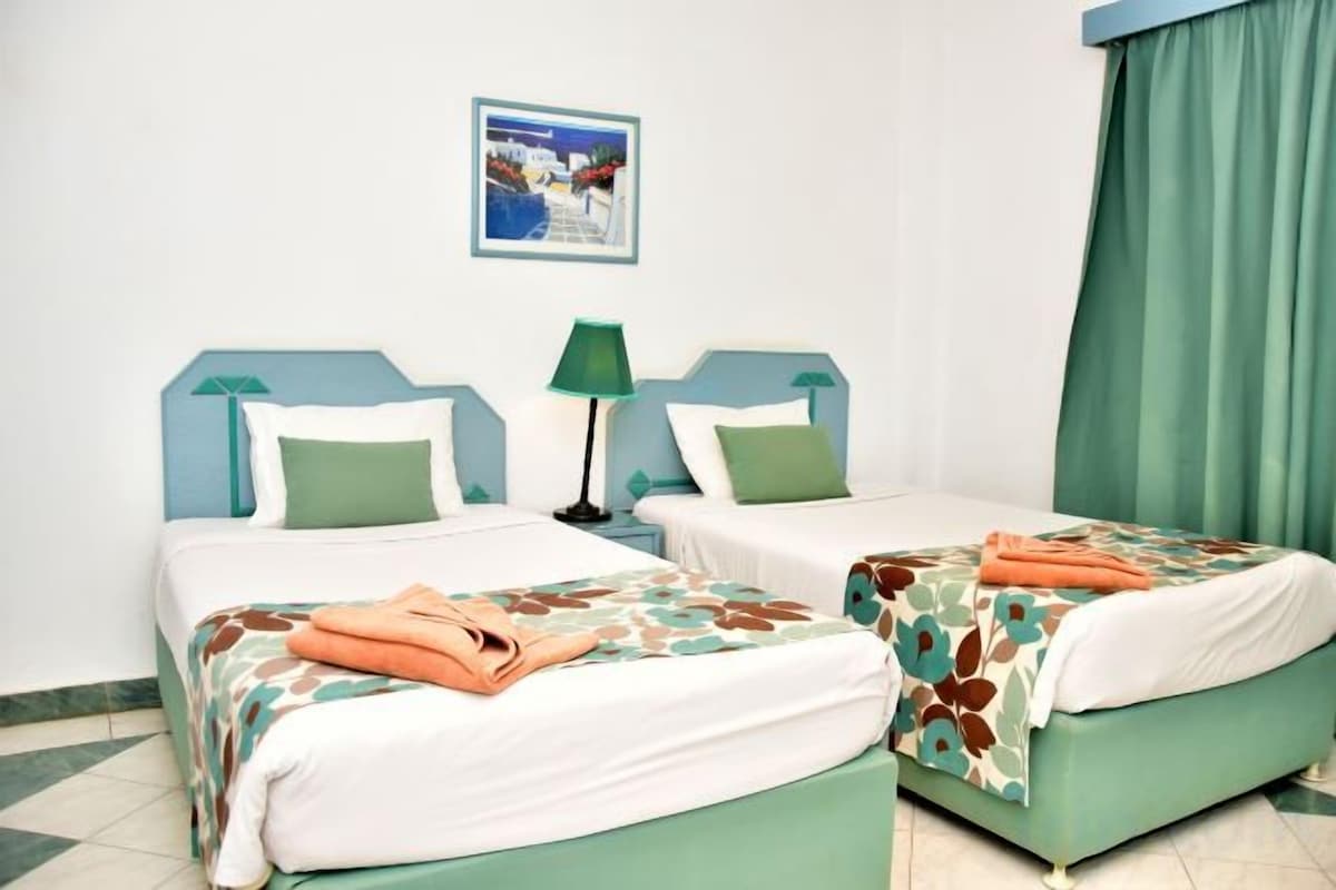 1 habitación y sábanas de algodón egipcio
