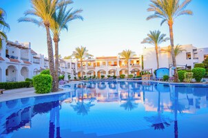 Outdoor pool, pool umbrellas, pool loungers