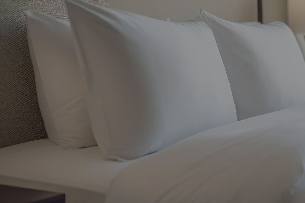 Premium bedding, pillow-top beds, desk, laptop workspace