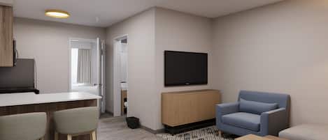 A modern living room with a flat-screen TV, a blue armchair, a sofa, and a kitchen area with a bar.