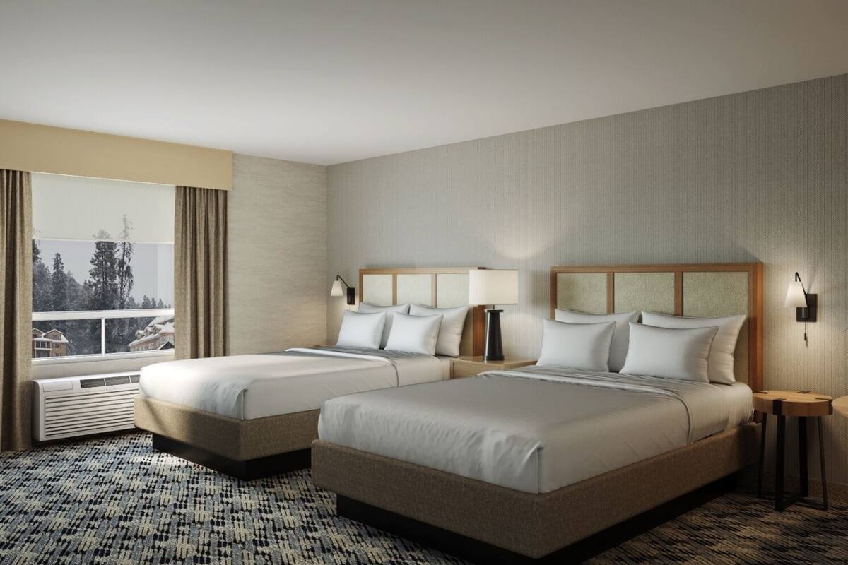 Premium bedding, pillow-top beds, desk, laptop workspace