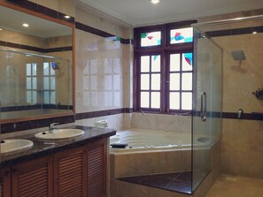 Luxury Family Suite With Balcony | Bathroom | Hair dryer, towels