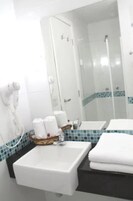 Shower, free toiletries, hair dryer, towels