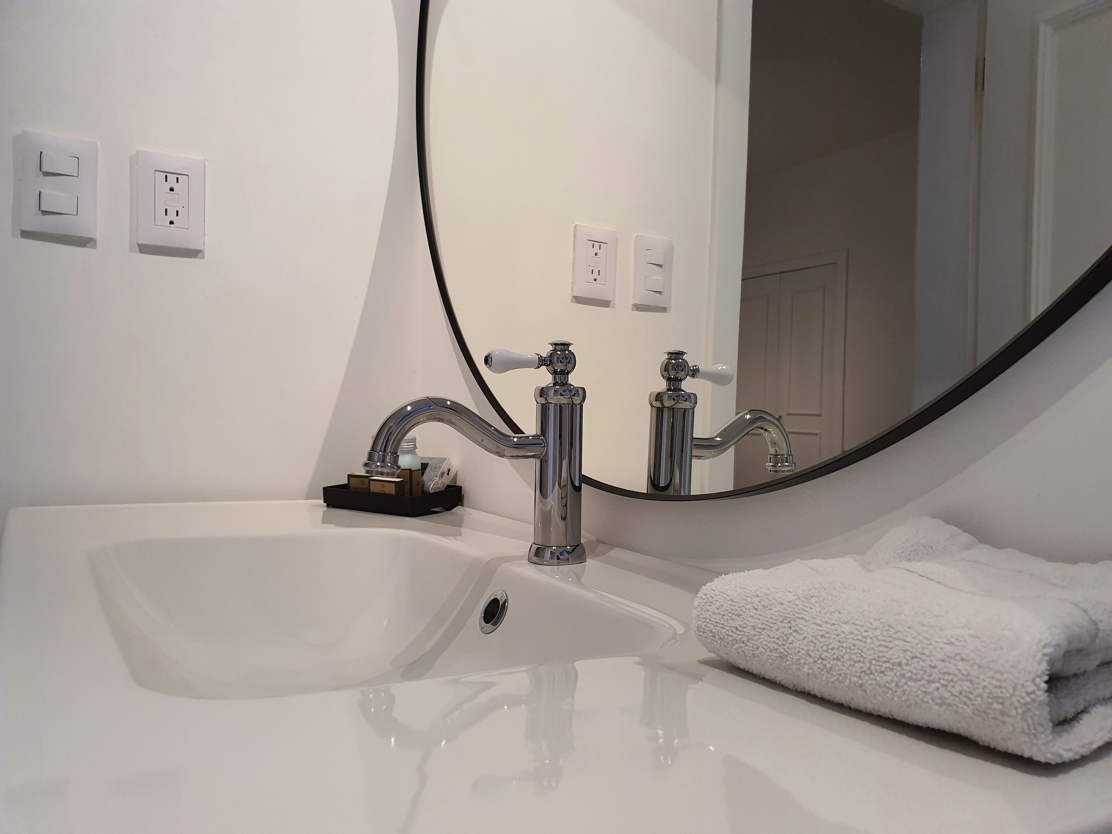 classic apartment | bathroom | shower, hair dryer, towels, soap