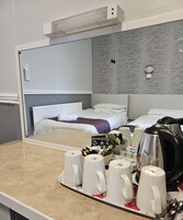 Familiekamer (2 adults + 2 children) | Een strijkplank/strijkijzer, gratis wifi, beddengoed