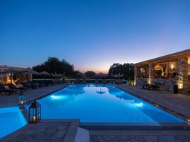 Seasonal outdoor pool, pool umbrellas, pool loungers