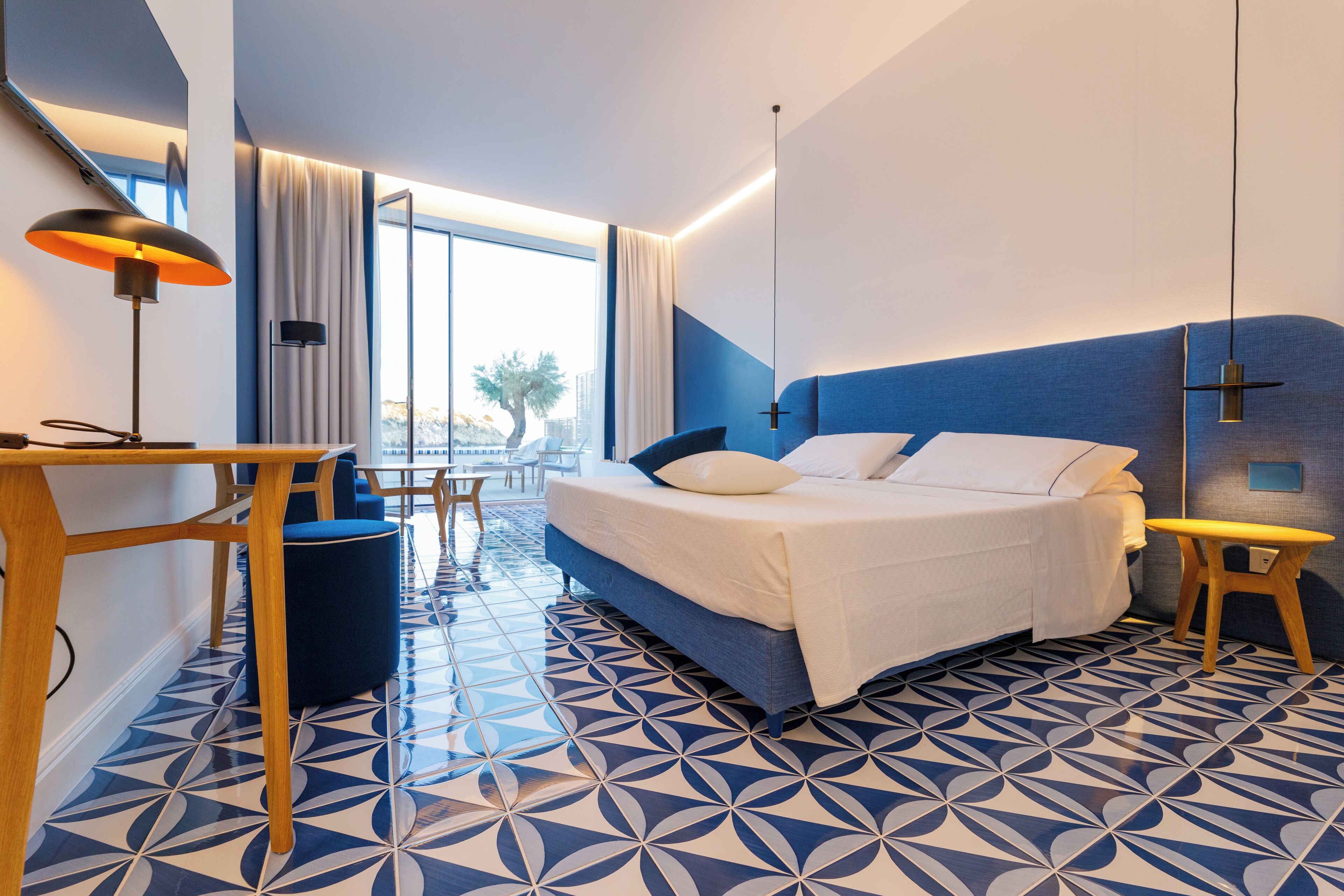 panoramic suite, 1 queen bed, hot tub, sea view | 1 bedroom, premium bedding, minibar, in-room safe